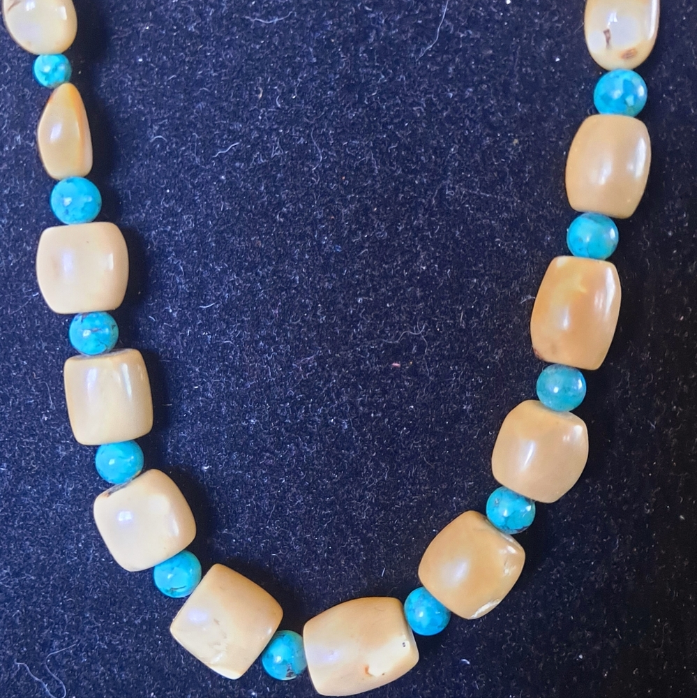 Turquoise necklace 18" drop with sterling silver toggle closure.